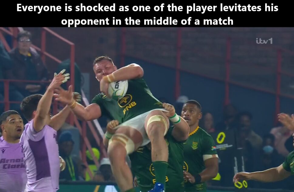 Opposing team is scrambling to keep their teammate down